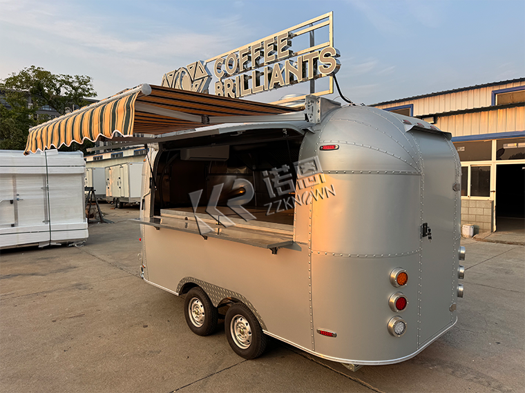 Real exterior project image of ZZKNOWN KN-QF400 oxidized aluminum food trailer