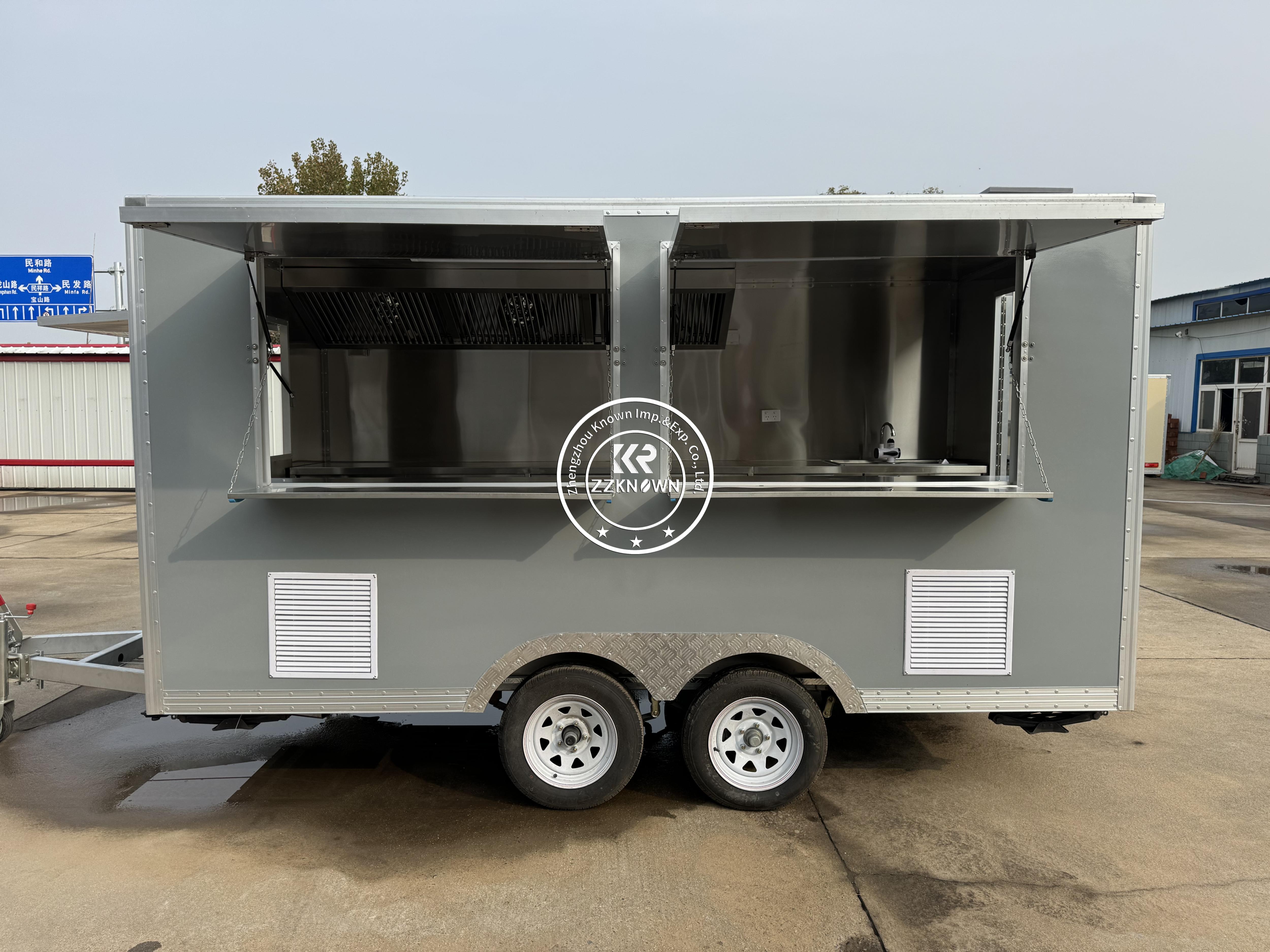 In stock food trailer prepared for sale in the USA with clean exterior and fully equipped kitchen